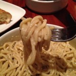 Cheesy noodles on a fork