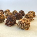 A close up of 9 nutrition bar dough balls