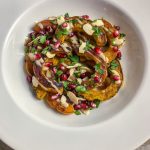 Delicata Squash with pomegranate, parsley and almonds