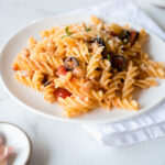 Small plate of fusilli pasta with tomato sauce