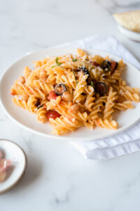 Small plate of fusilli pasta with tomato sauce