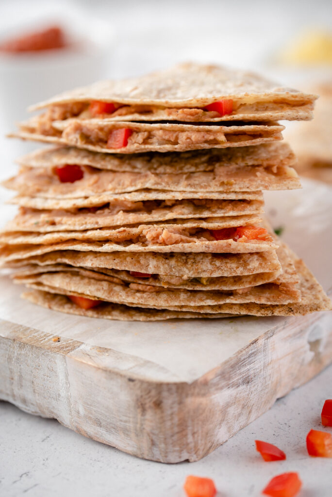 Close up of a stack of cut quesadillas