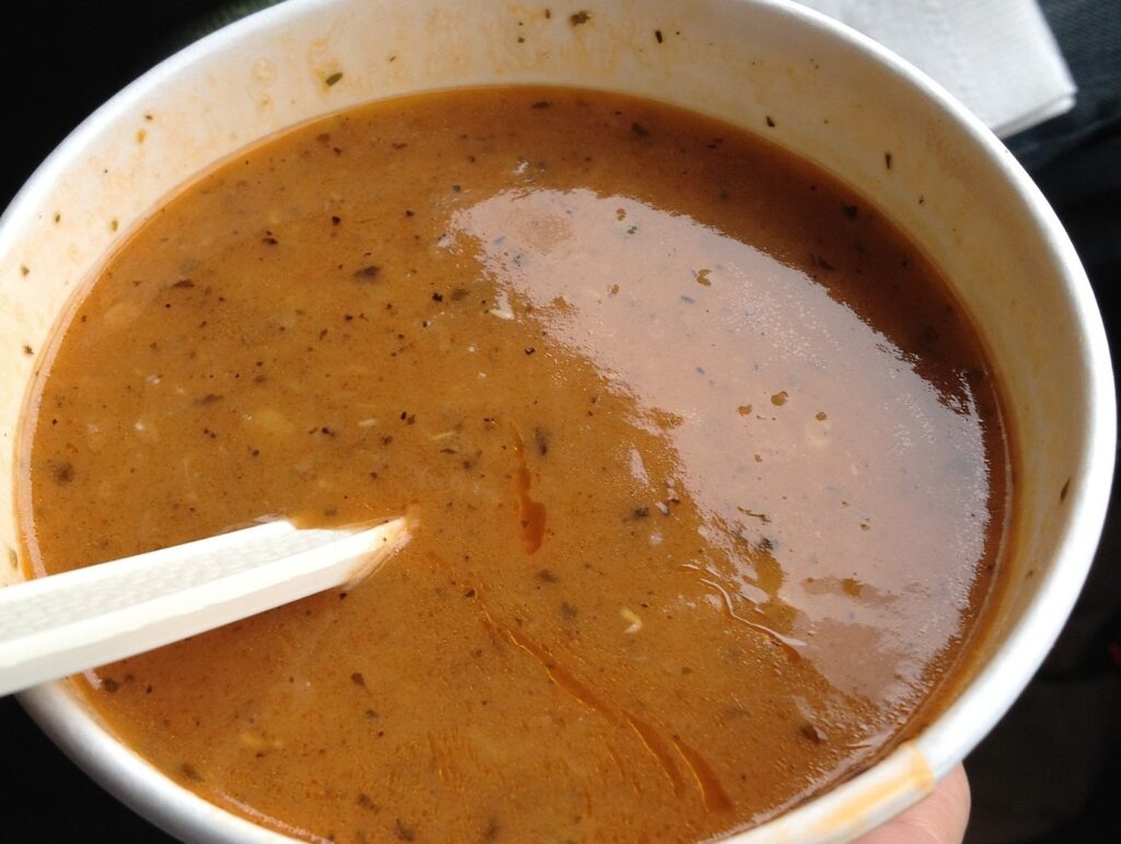 Lentil soup in a paper bowl