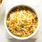 Top down view of rice in a white bowl