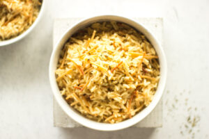 Top down view of rice in a white bowl