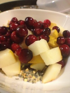 Cranberries, pears and holy crap cereal in a bowll