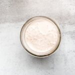 Top down view of canning jar filled with coconut horchata