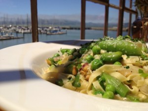 Linguini with snap and English peas, spring onions and pine nuts