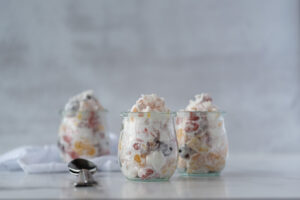 Three small jars filled with ambrosia salad