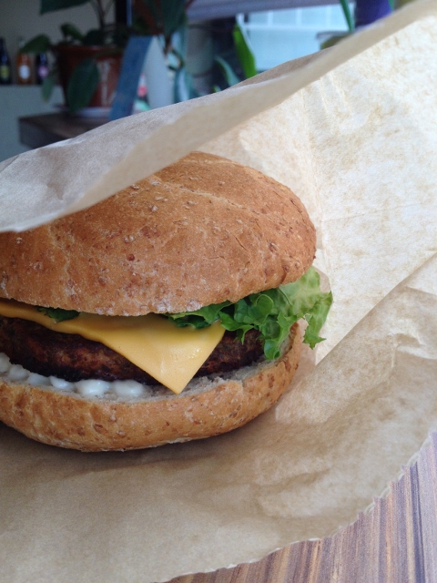 Vegetarian burger on a bun with cheese