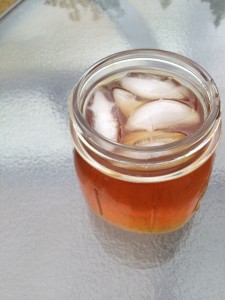 Mason jar filled with iced coffee tea