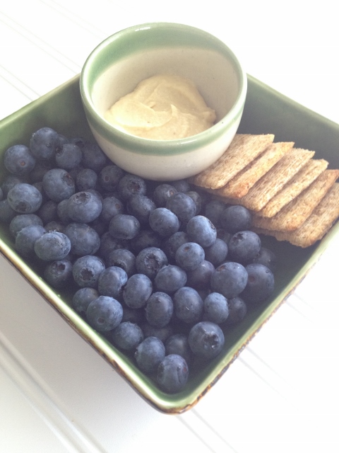 6 crackers, 1 cup blueberries, 2 tablespoons hummus