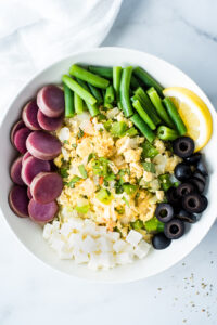 Top down view of a bowl of tofu and veggies