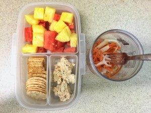 Watermelon, pineapple, crackers, feta spread, pickled carrots bento lunch