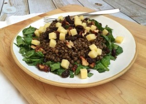 Spinach and lentil salad with lemon vinaigrette, white cheddar and raisins