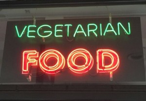 Neon vegetarian food sign