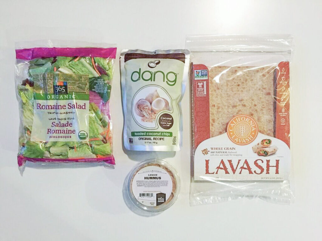 Bags of lettuce, coconut chips and lavash bread