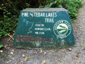 pine-and-cedar-lakes-sign