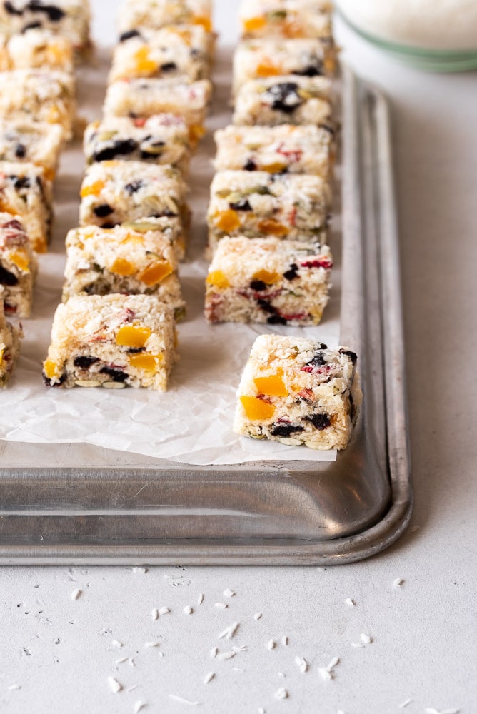 Sheet pan topped with fruity coconut treats