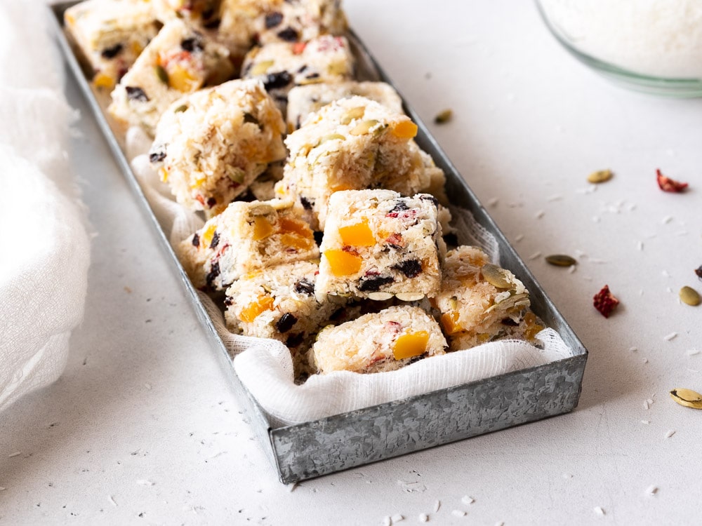 Silver tray full of fruity square treats