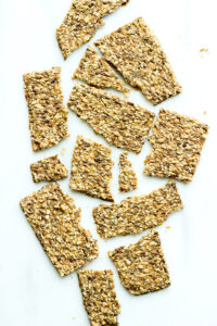 Top down view of broken pieces of whole grain cracker