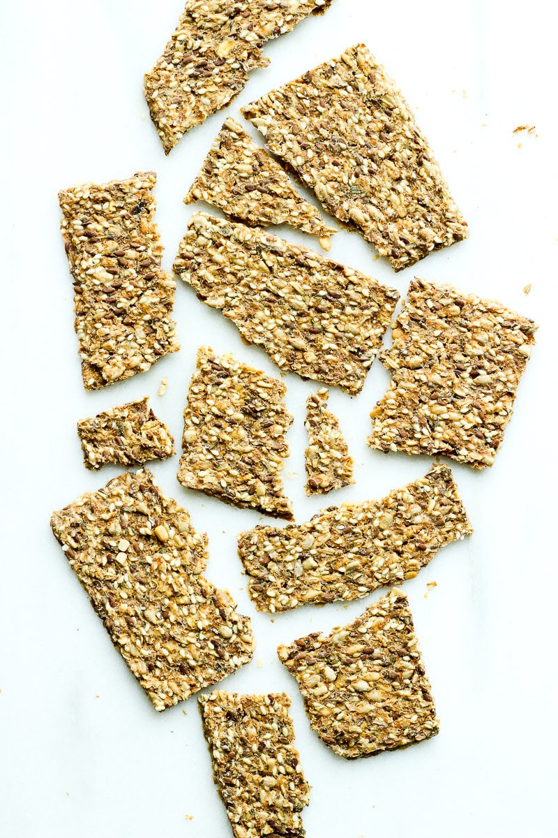 Top down view of broken pieces of whole grain cracker