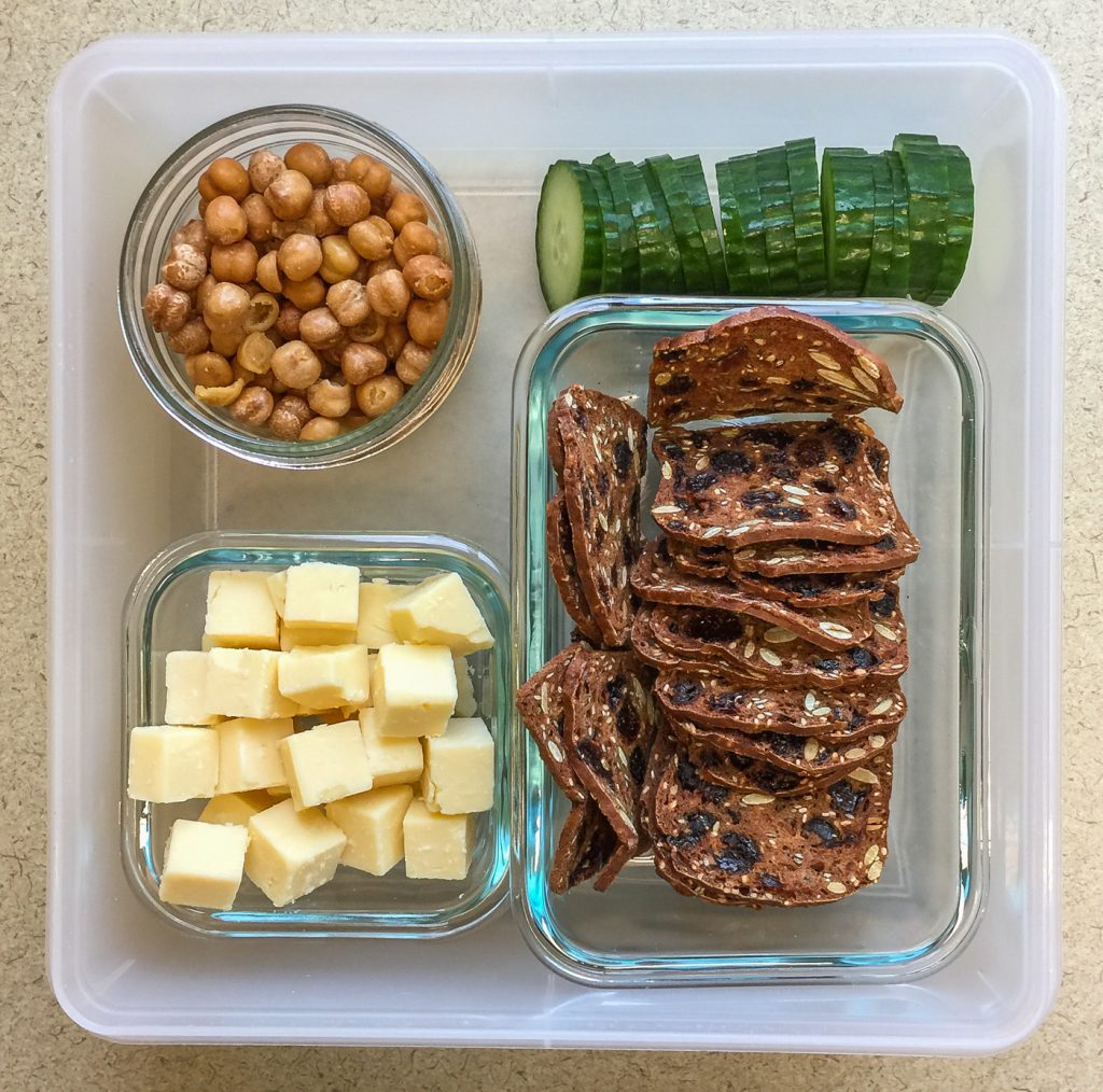 Healthy snacks at work cheddar, chickpeas, cucumber, crackers