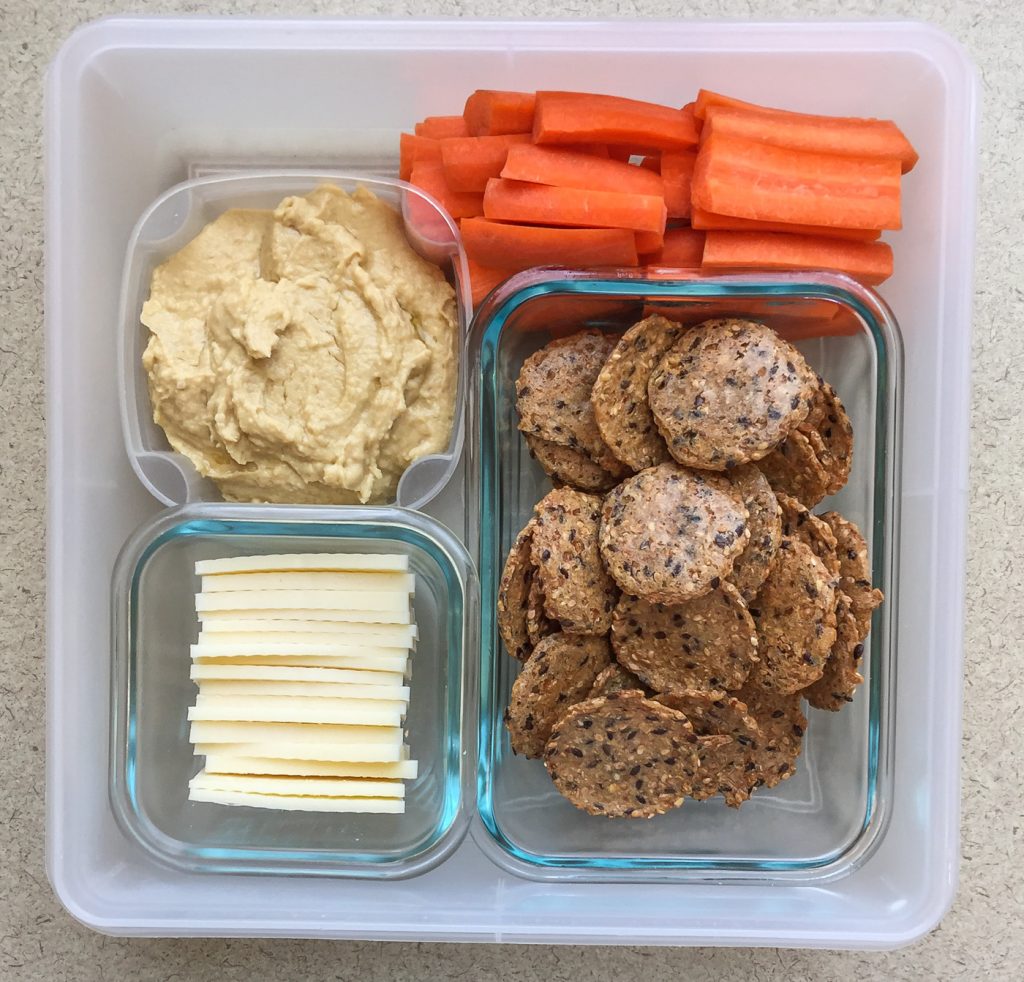 Healthy work snacks hummus, carrots, Mary's Gone Crackers, mozzarella cheese