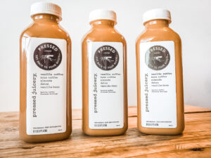 3 bottles of Pressed Juicery Vanilla Coffee