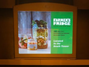 Video screen in elevator showing ad for Farmer's Fridge