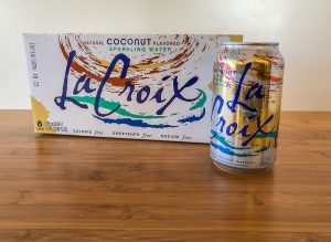 Can of coconut LaCroix next to the box/case