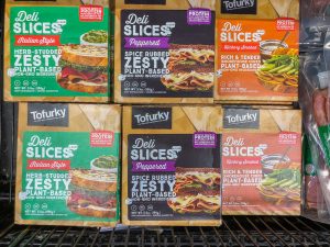 3 different packages of meatless deli slices