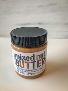 A jar of mixed nut butter
