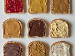 Several slices of bread with different spreads