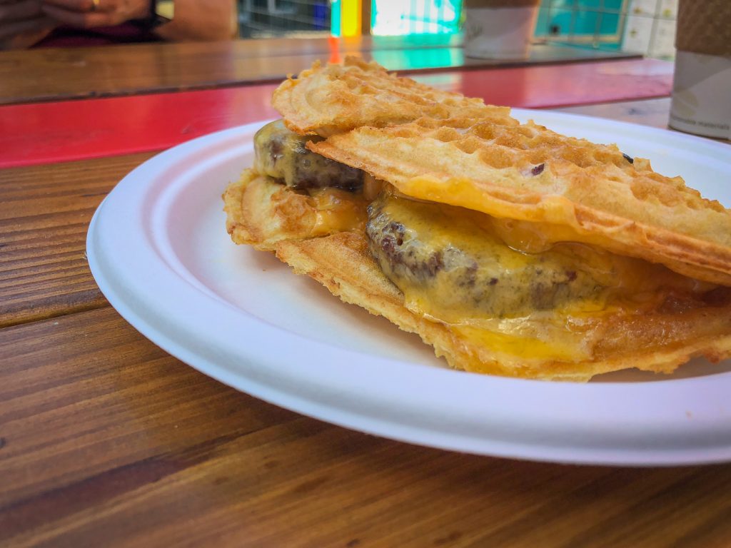 Waffle with vegetarian sausage and cheese