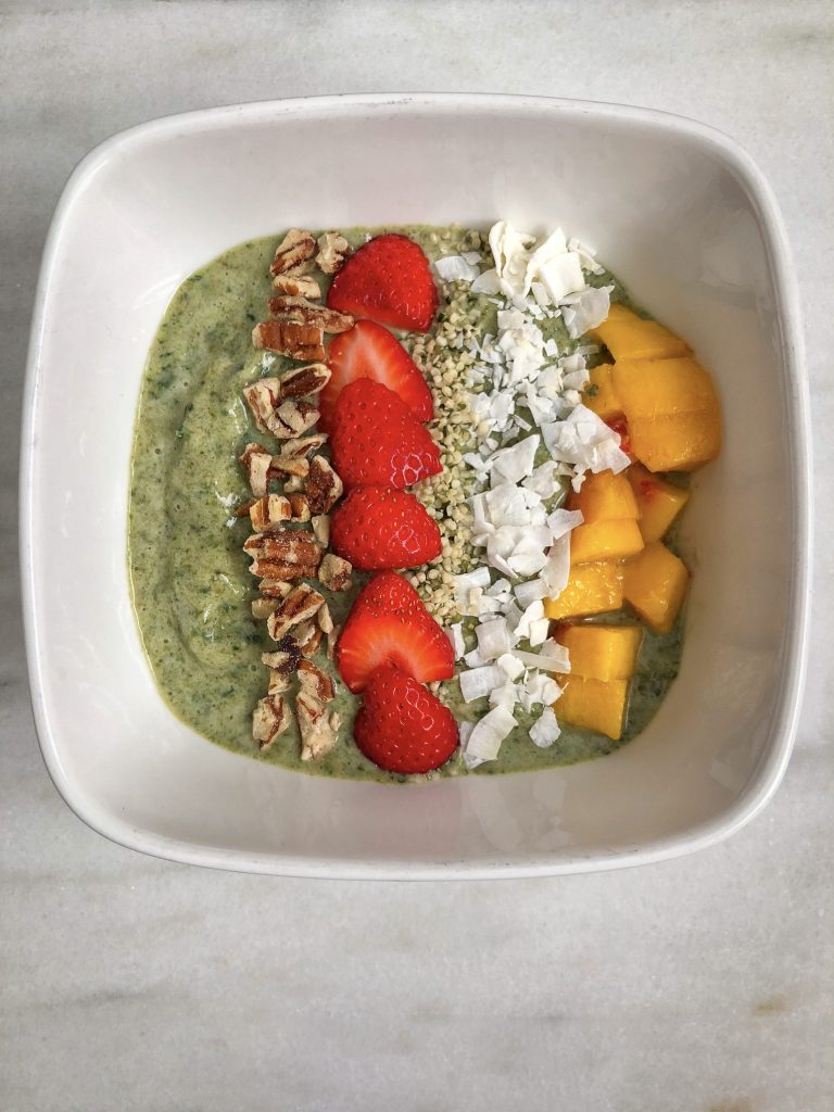 Top down picture of a smoothie bowl with toppings