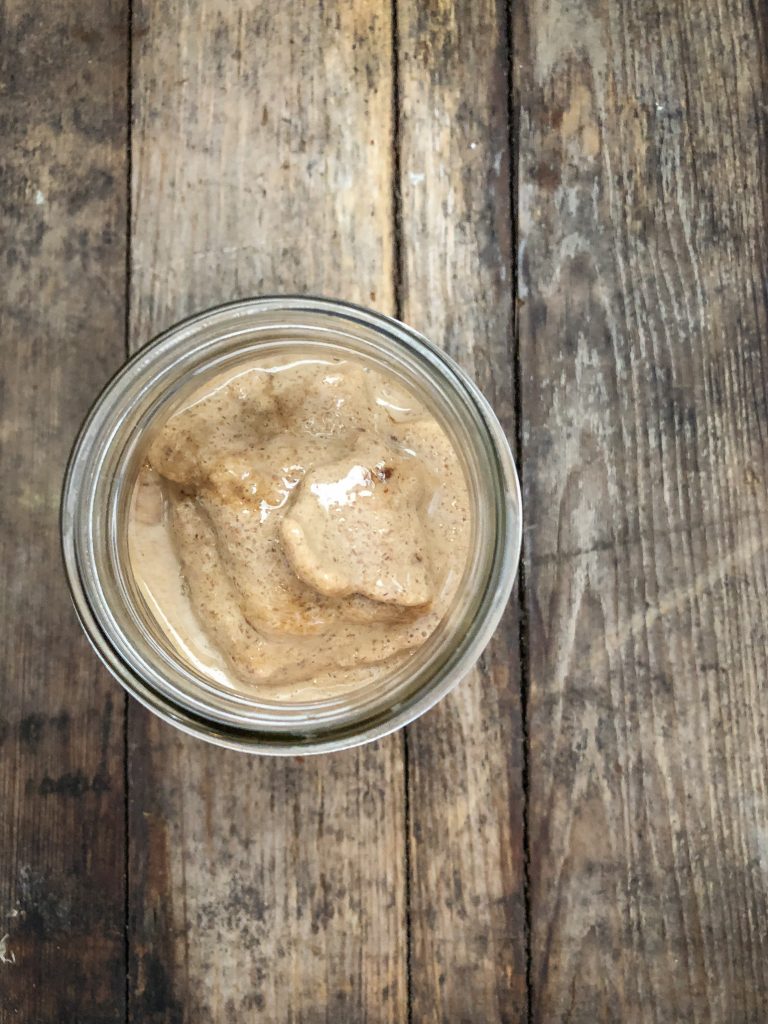 Top down view of smoothie in a mason jar