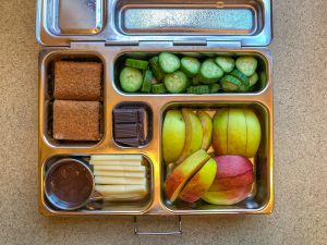 Bento box filled with vegetables and fruit