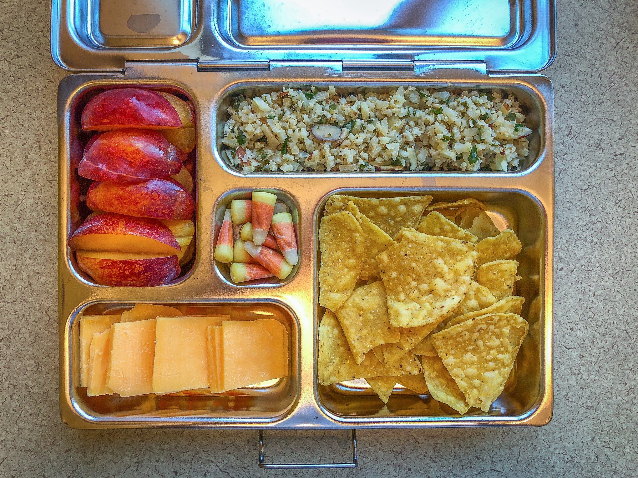 Bento box filled with fruit and vegetables