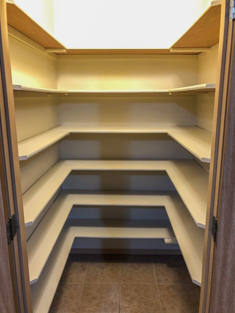 Pantry with painted shelves