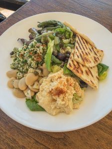 Bowl with hummus, pita and butterbeans
