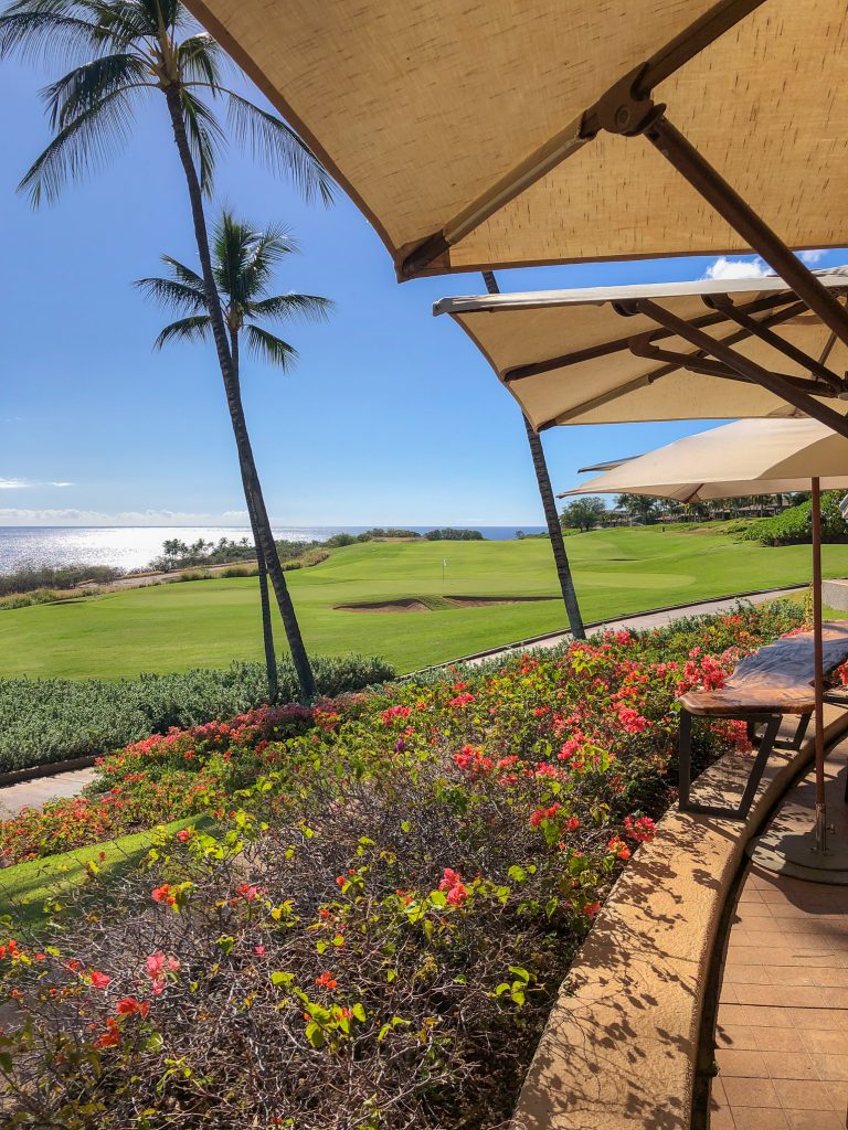 Flower bed, golf course, and ocean view