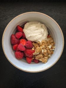 Bowl of granola, berries and coconut yogurt