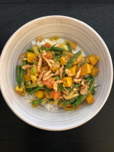 Bowl of curried veggies over rice