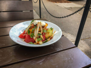 Bowl with tomato salad