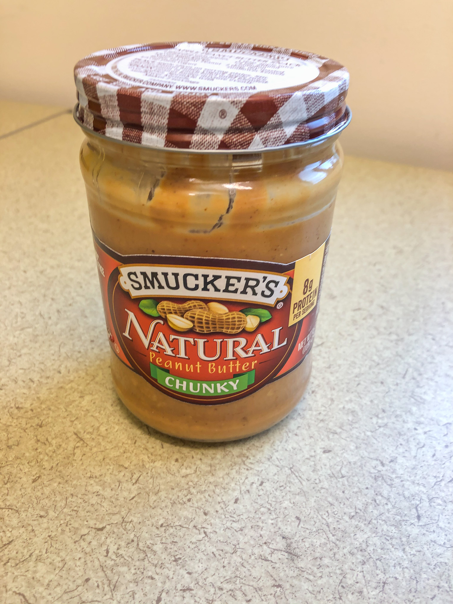 Jar of Smuckers peanut butter