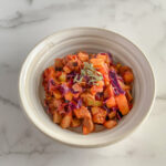 Bowl of vegetables and vegetarian sausage