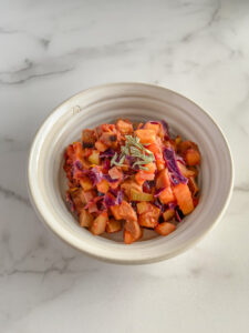 Bowl of vegetables and vegetarian sausage