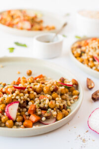 Close up plate full of chickpea couscous salad