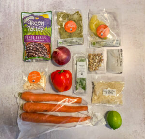 Top down picture of recipe ingredients in bags for chili